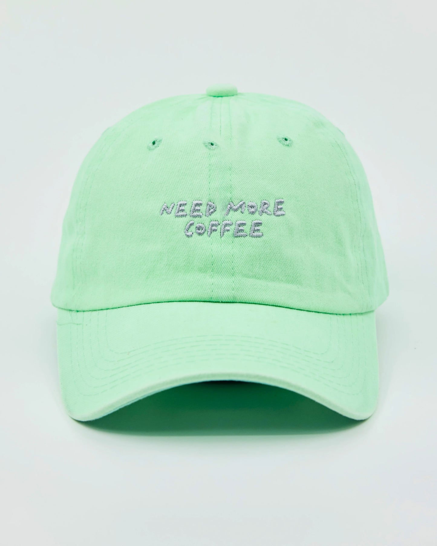 Front view of Need More Coffee Light Green Washed Cap