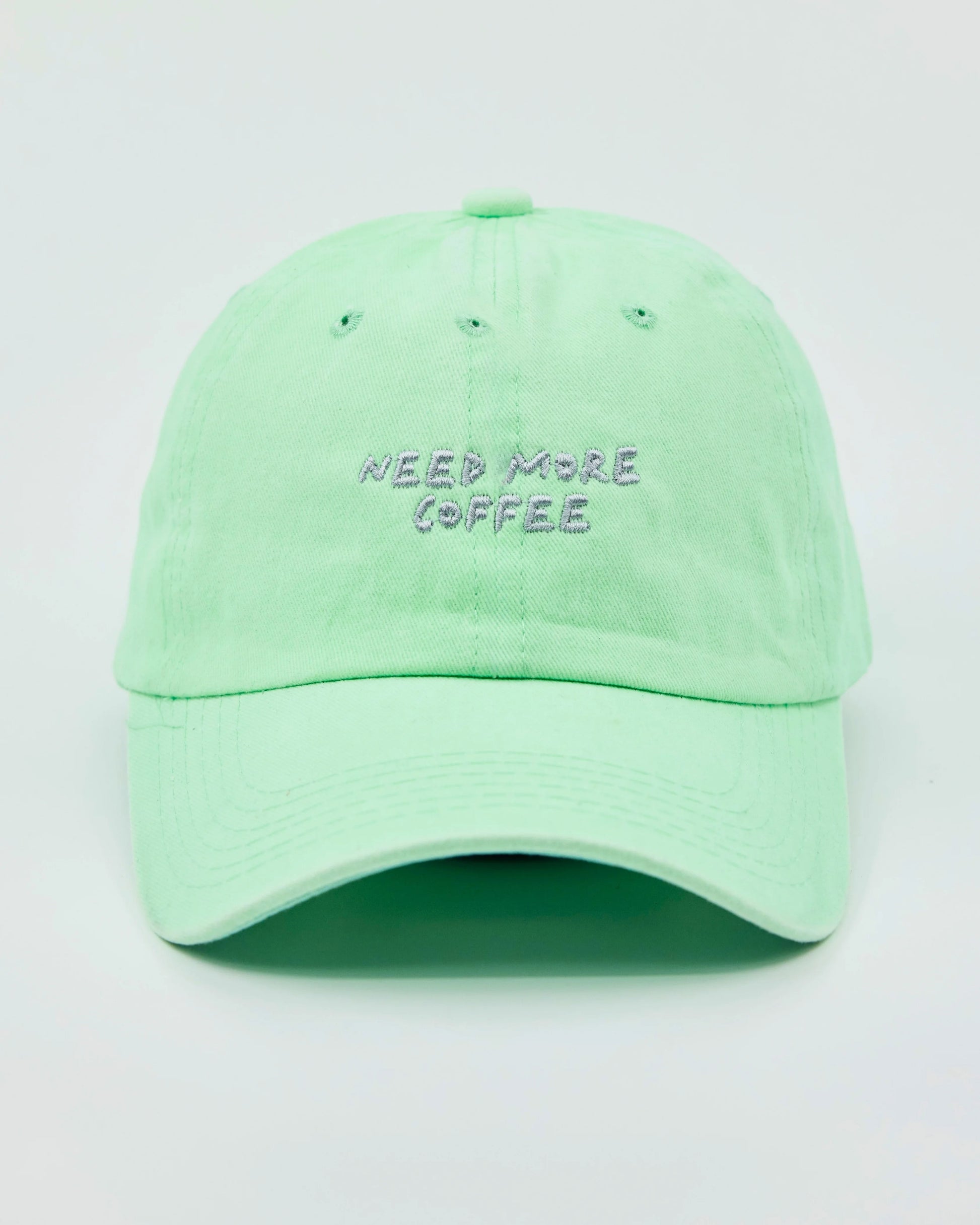 Front view of Need More Coffee Light Green Washed Cap
