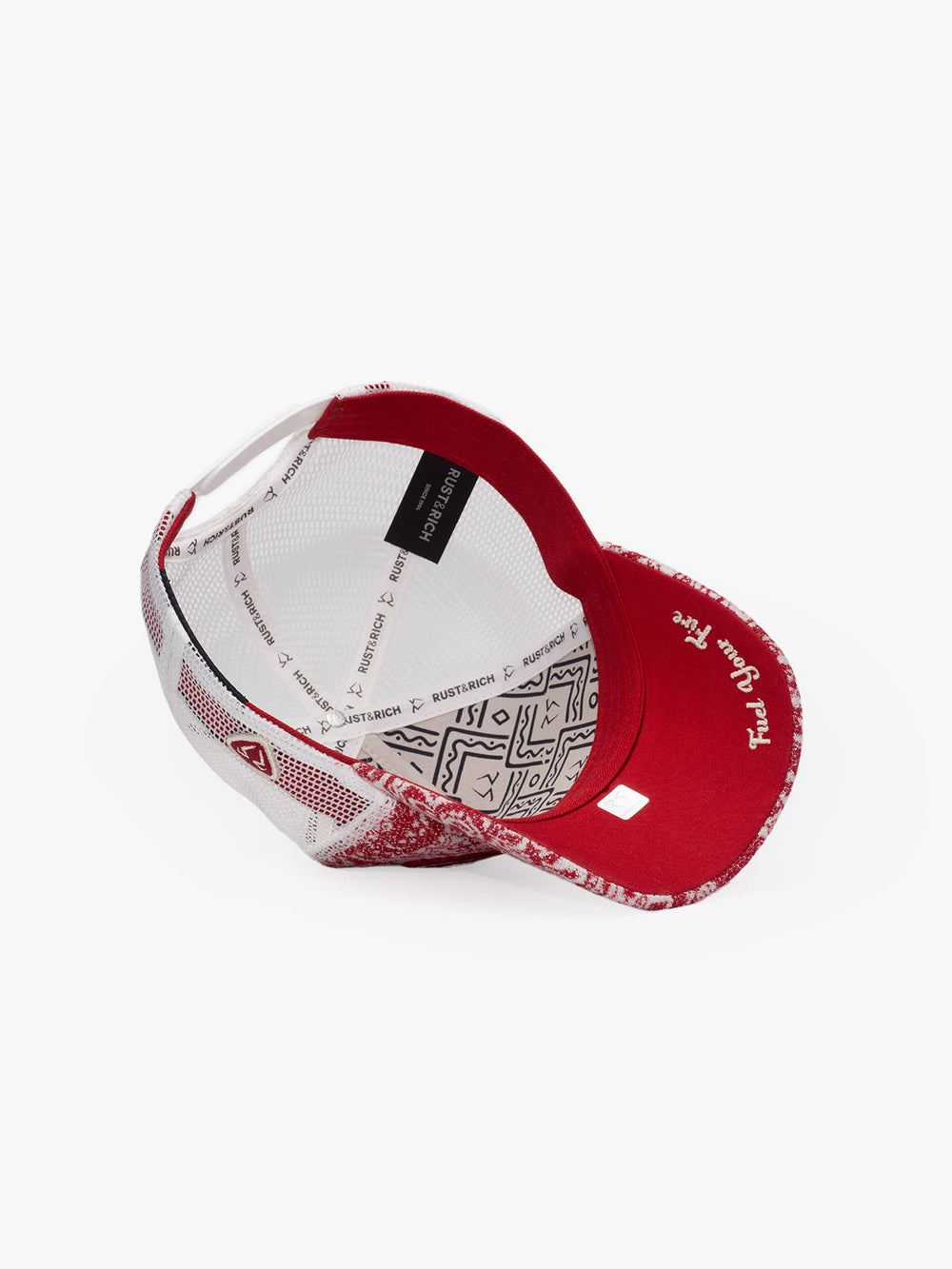 Red and white cap with geometric pattern on a white background