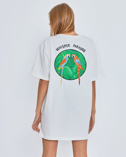 White t-shirt with 'Whisper Paradise' design on the back, worn by a person against a light gray background