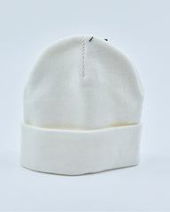 White beanie on a light gray background