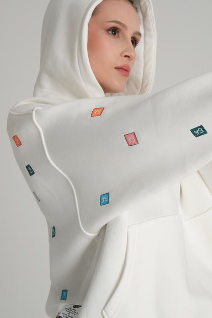 side look of female wearing white love pixel hoodie