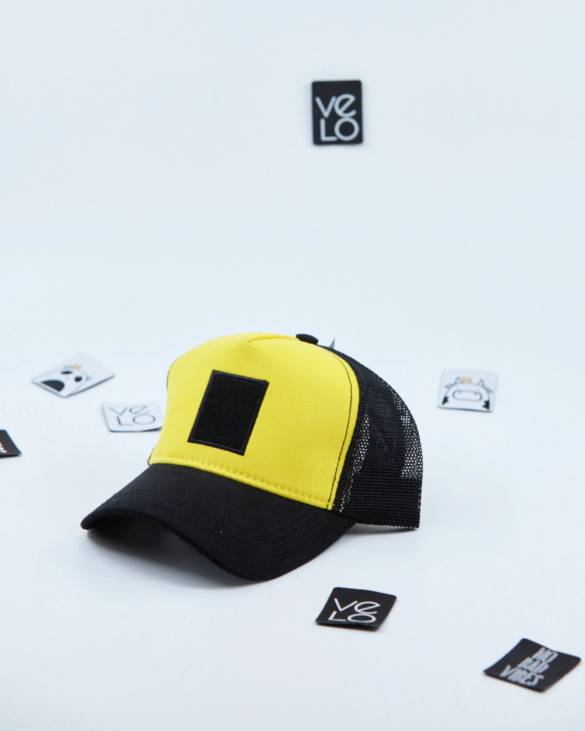 Side view of Yellow and Black Customisable Trucker Cap