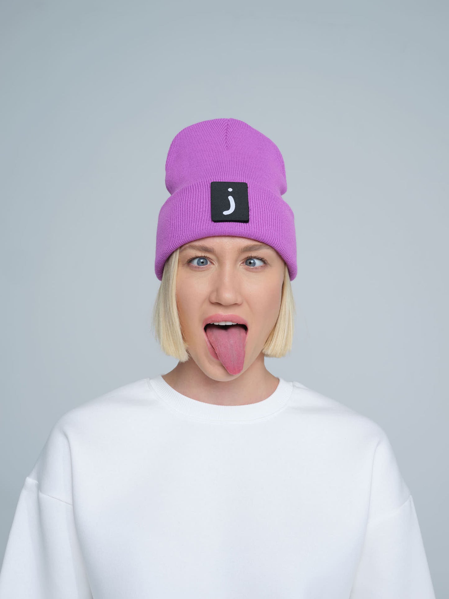 person wearing purple patch ready beanie